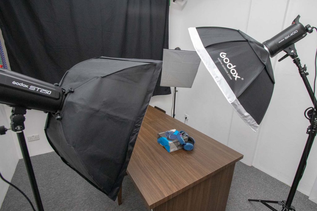 Product photography in an office studio with our photography service in Brunei with backdrops available
