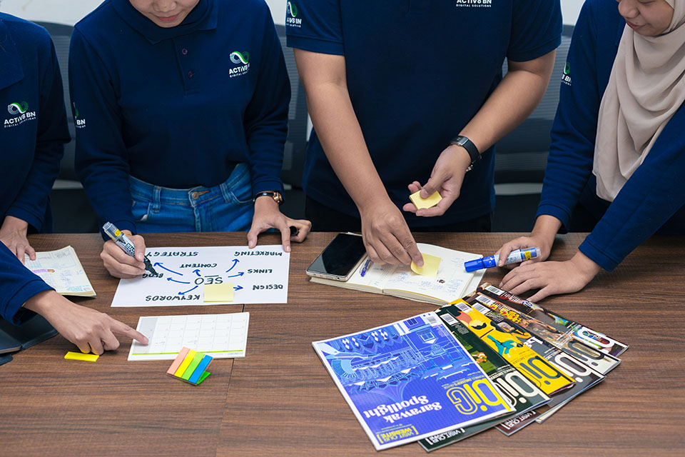 Digital marketing team members planning the next move for increasing online presence in Brunei