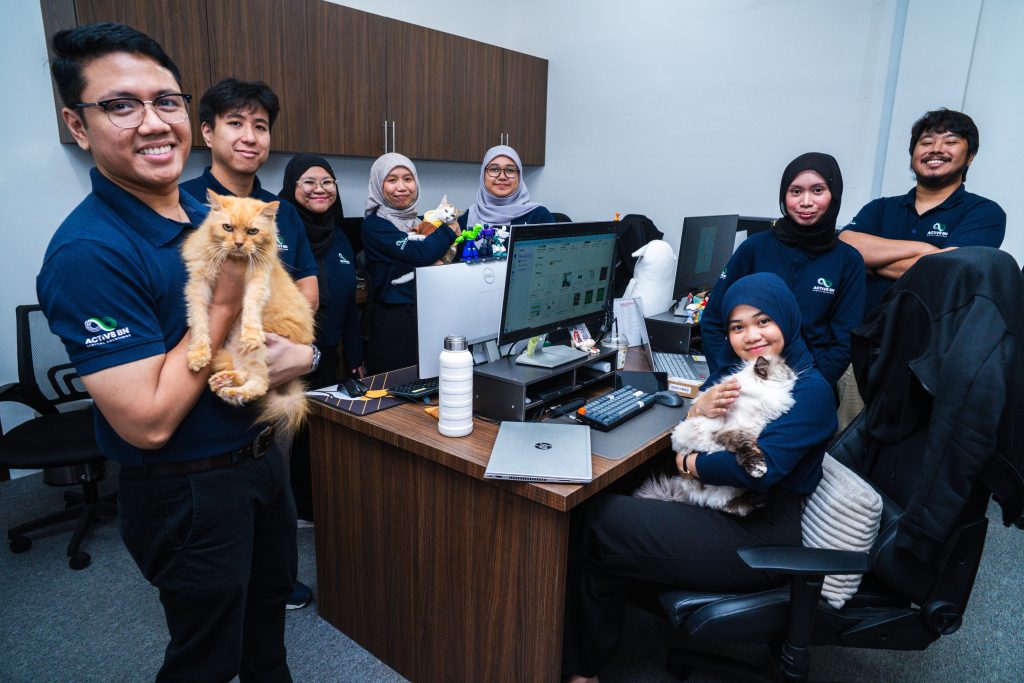Cats in the Office: How Our Monthly “Bring Your Cat Day” Boosts Workplace Wellbeing