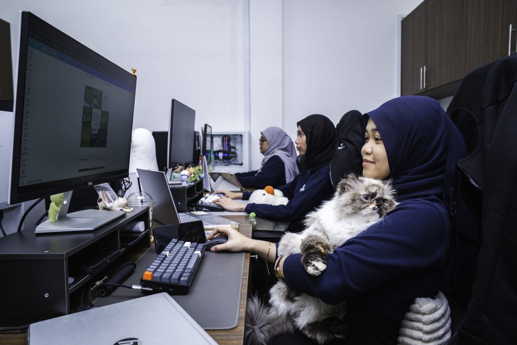 Cats in the Office: How Our Monthly “Bring Your Cat Day” Boosts Workplace Wellbeing